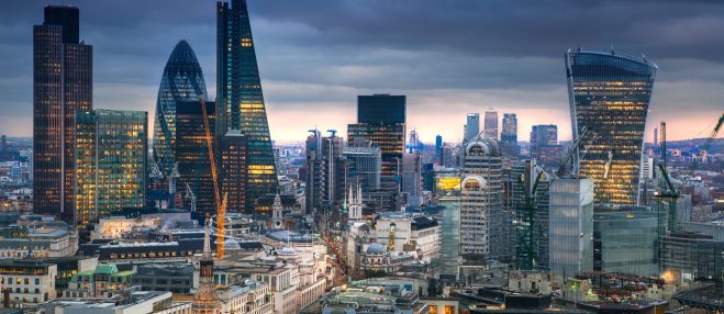 London, UK  - January 27, 2015:  City of London, business and banking area. London's panorama at sun set. View from the St. Paul cathedral
